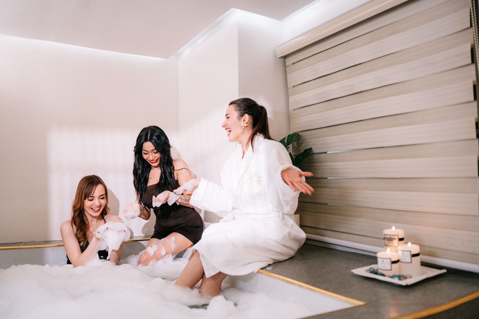 Guests raising a toast during a shared spa day